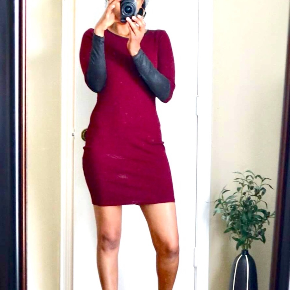 Xs burgundy dress, the sleeves have  beautiful soft black leather look.